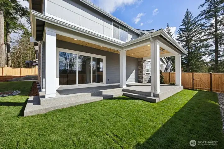 large, covered patio with overhead heating. A perfectly serene space for relaxing or entertaining.