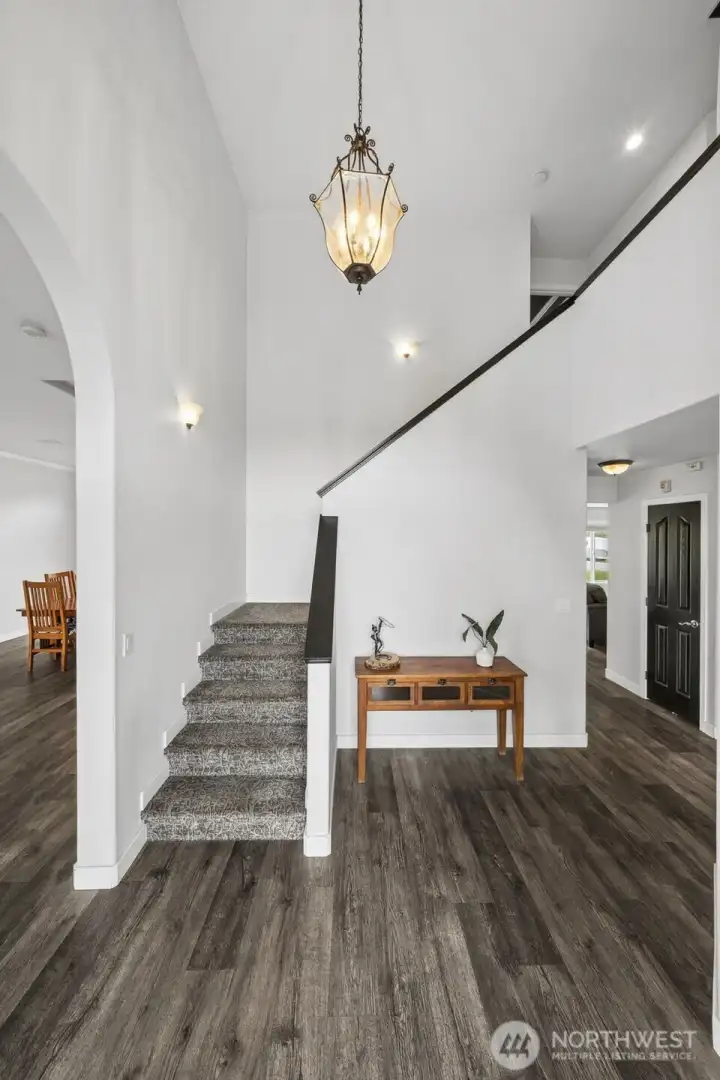 A grand entry welcomes you into the home, setting the tone with an impressive and inviting first impression.