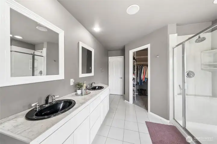 Walk-in closet is organized to keep everyone nice & neat!