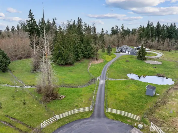 Quietly located at the end of the cul-de-sac this home sits on 5 acres back from the road that creates a sense of tranquility.