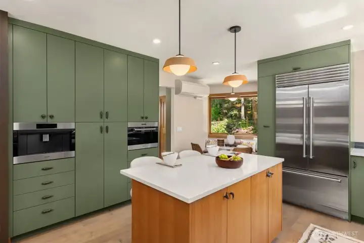 Built in Wolf appliances and SubZero fridge.