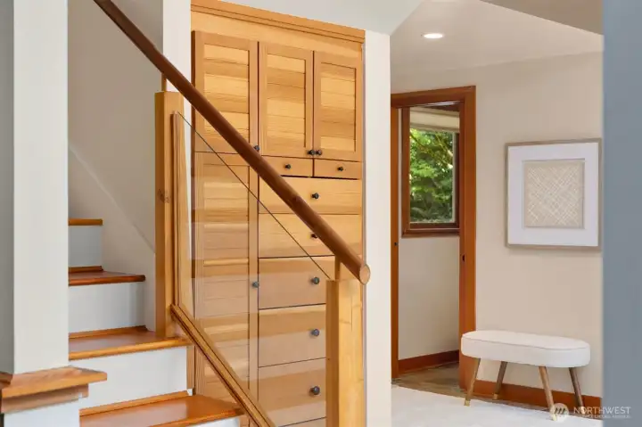 More beautiful built-ins, stairs to upper level.