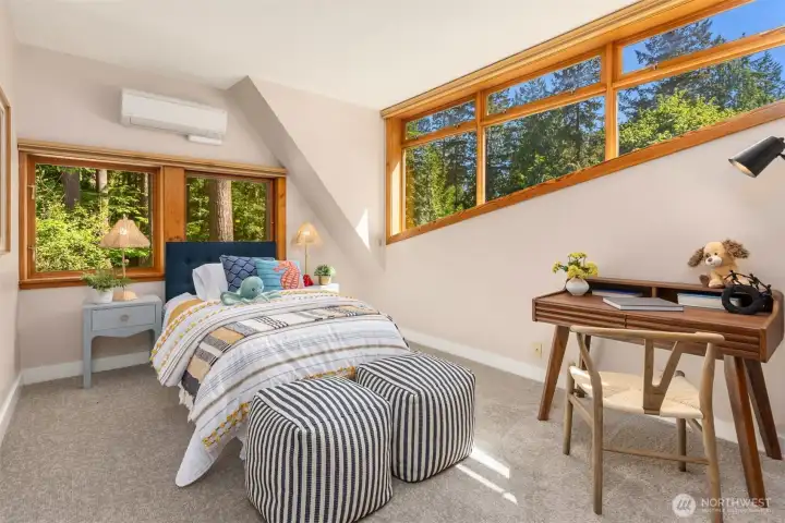 One of the additional upper level bedrooms - so cute!