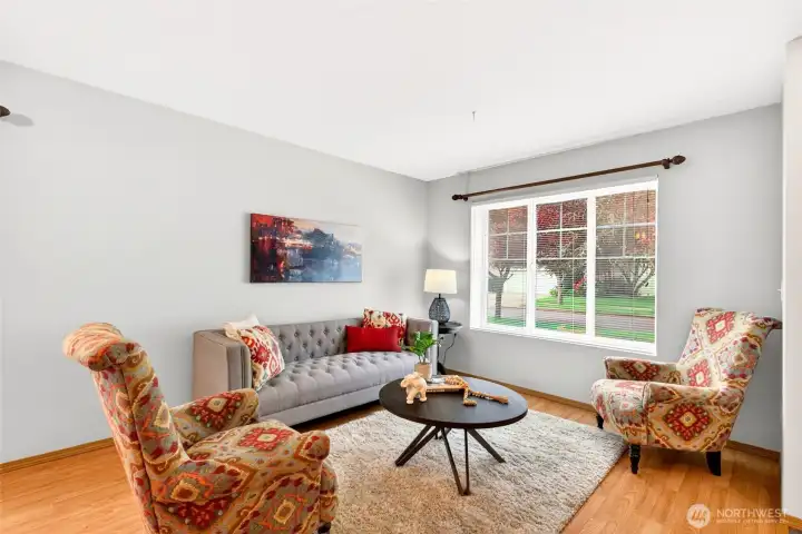 Living room just off the entry with ample room to hang out and relax. Living room just off the entry with ample room to hang out and relax.