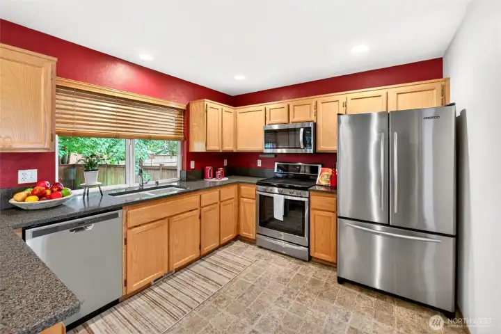It is a fun kitchen to cook and entertain in. Open concept with lots of counter top space for many hands to prep.Newer appliances all stay. It is a fun kitchen to cook and entertain in. Open concept with lots of counter top space for many hands to prep.Newer appliances all stay.
