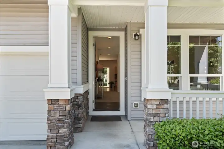 The porch creates a warm and inviting first impression while adding both character and functionality to the homes exterior.