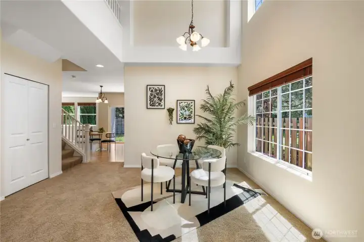 Filled with natural light, this inviting area provides an open flowing layout that easily accomodates gatherings and holiday celebrations.