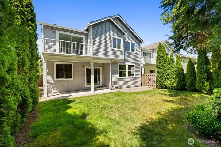 Another view of the private backyard and the mature landscaping.