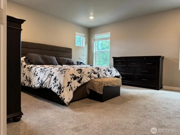 This primary bedroom has ample space for all your things. This primary bedroom has ample space for all your things.