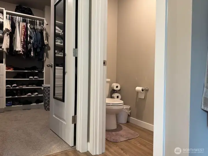 Just off the bathroom is the primary closet. Just off the bathroom is the primary closet.