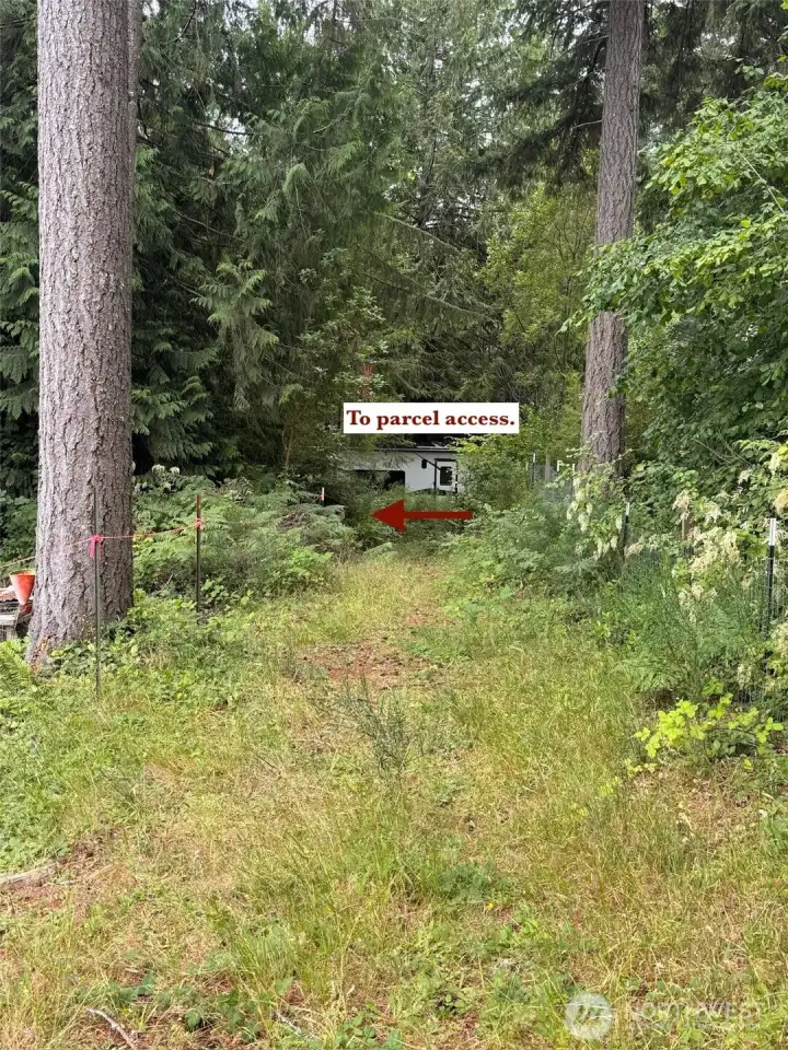 Turn left at trailer to continue on easement. Turn left at trailer to continue on easement.