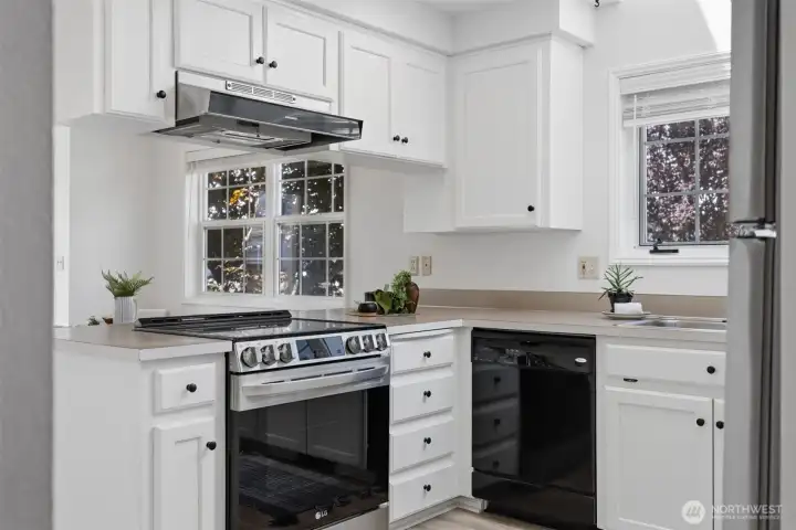 Updated range and refridgerator. Updated range and refridgerator.