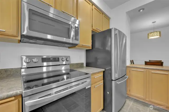 Kitchen with stainless appliances, newer range