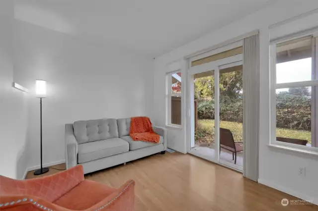 Family room. Step outside through the glass sliding door to access the patio