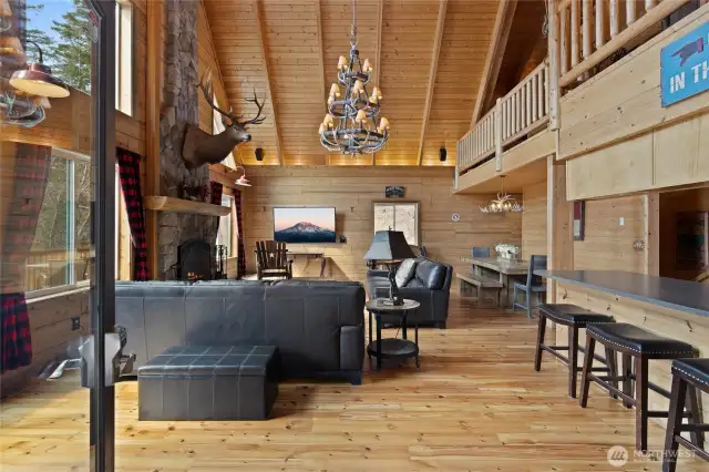 You will love this home from the moment you open the door! It has soaring ceilings and warm wood accents.
