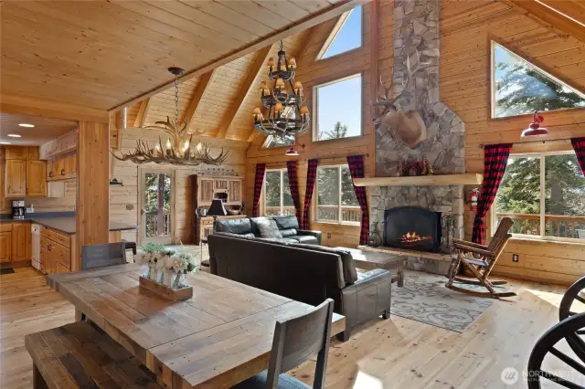 In addition to the island bar seating that is in the kitchen, the greatroom has a large dining space.