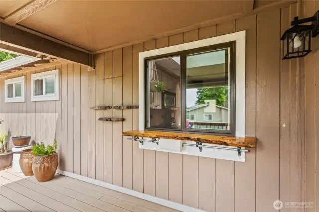 Serving from the kitchen to the back deck will be a breeze through this kitchen window! Margaritas and a view, anyone?