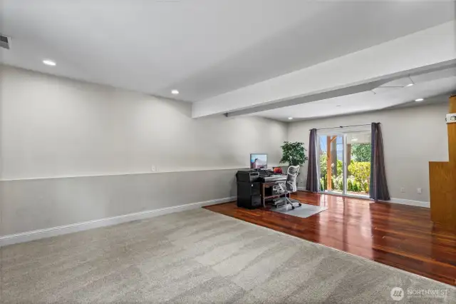 The lower level offers many options for your living needs and with new carpet and padding and Koa wood floors. This family room is ready for game night!