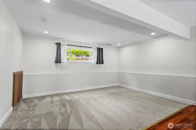 Install a wall in this area to create a potential 'fourth' bedroom or a dedicated office space The sunny window and recessed lighting enhance the brightness of this room.