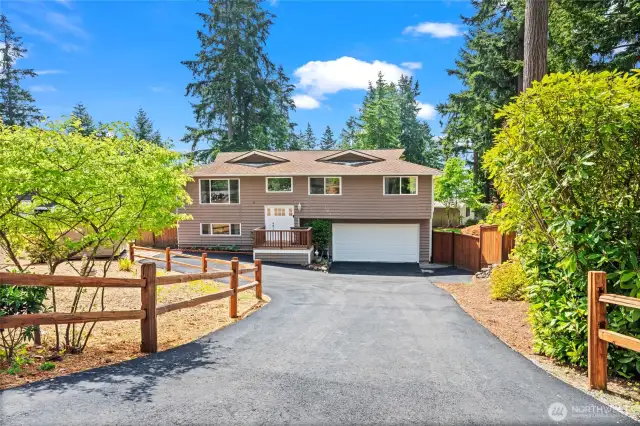The driveway was completely replaced and resealed. The additional turnaround space to the right of the garage improves access to home for you and your guests.