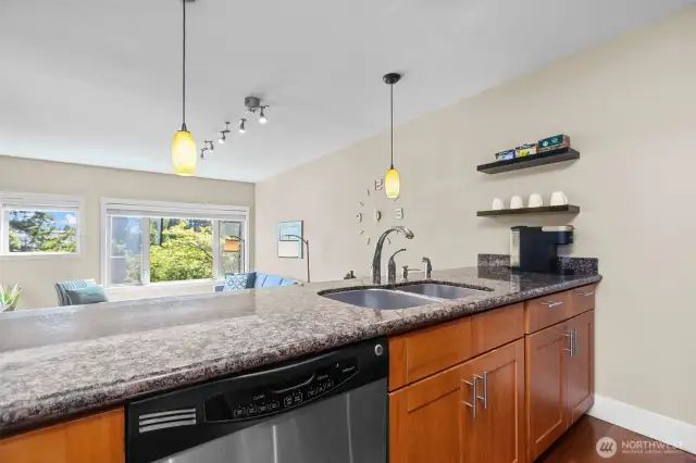 I love the pendant lighting over the eating bar and the shelves the seller added for convenience.