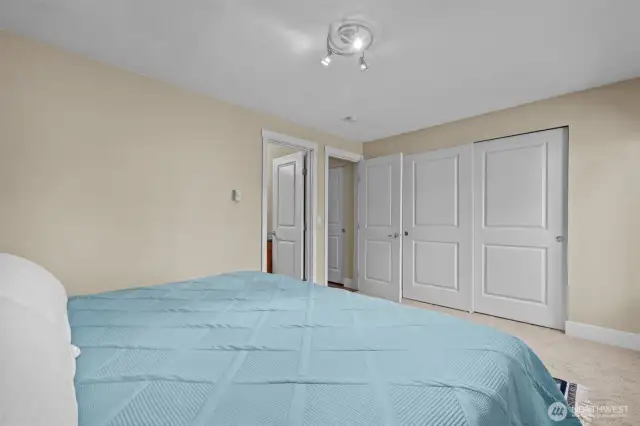 There is no shortage of closet space in the Primary!  I like that this one is a 3-door closet w/sliding panels.