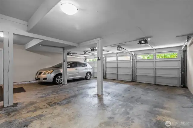 The center space is for Apt 203.  This garage is shared with 2 other homes.  There is also a storage room on this lowest level (ground level).
