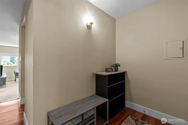 Nice, well-lit entryway.  I immediately noticed the engineered hardwood floors.  There is also very easy access to your power box here.