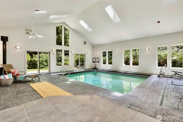 Landing to atrium and pool room!  Features gas fireplace for warming your winter days!