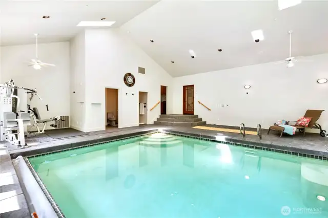 Pool is solar-heated and has electronic cover.