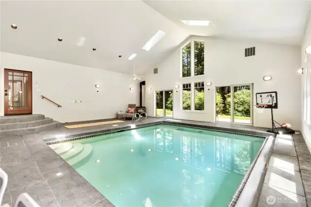 Sliding glass doors open to stamped concrete patio
