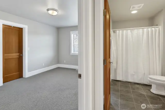 One of two upstairs bedrooms, this one has a walk-in-closet and also opens to the bathroom.
