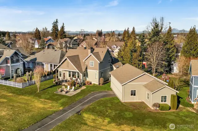 A low maintenance yard with in-ground irrigation, patio, and firepit area completes the back yard.