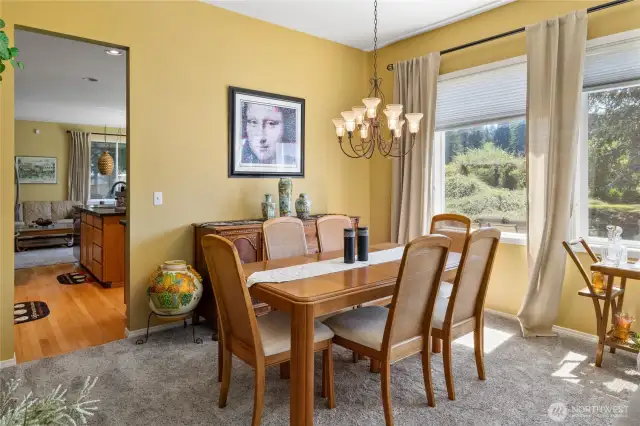 Dining area right off the kitchen, tons of light in here.