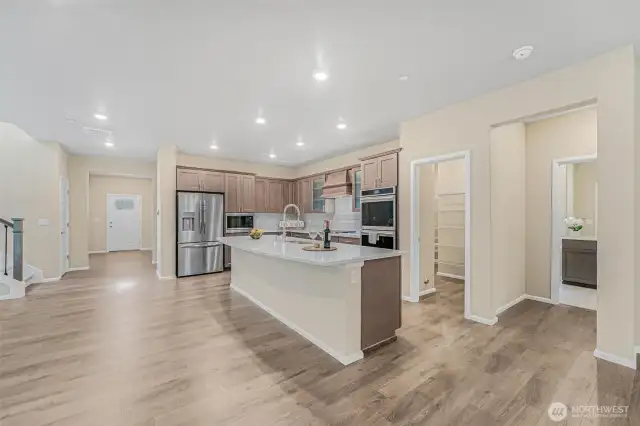 The quartz kitchen is a chef's delight! Plenty of space to bake and entertain.