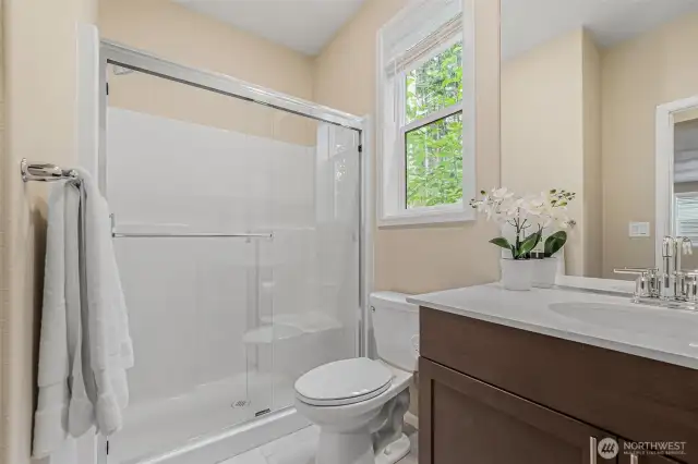 Main floor bath with shower is perfect for guests.