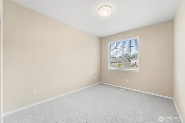 Upstairs bedroom 2 faces the front yard.