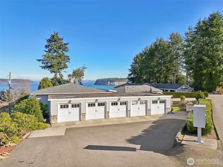The two garage doors on the left belong to you when you buy this condo. Ingress and egress are a breeze.  The mailbox condo is in the right of this photo
