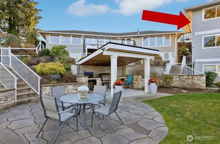 Covered BBQ area for the four condo owners to share...since it is such a small self-managed association, dues are very affordable.
