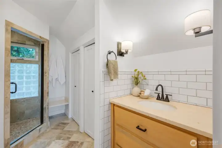 Primary bathroom with double vanities.
