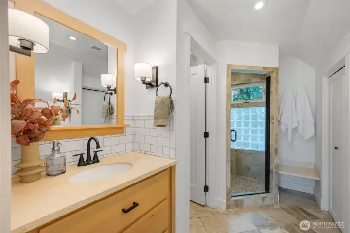 Large walk in shower and additional closets.