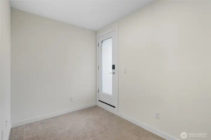 Flexible first-level bedroom, perfect as a home office, gym, or creative space to suit your needs.