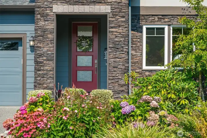 Covered front door entry.
