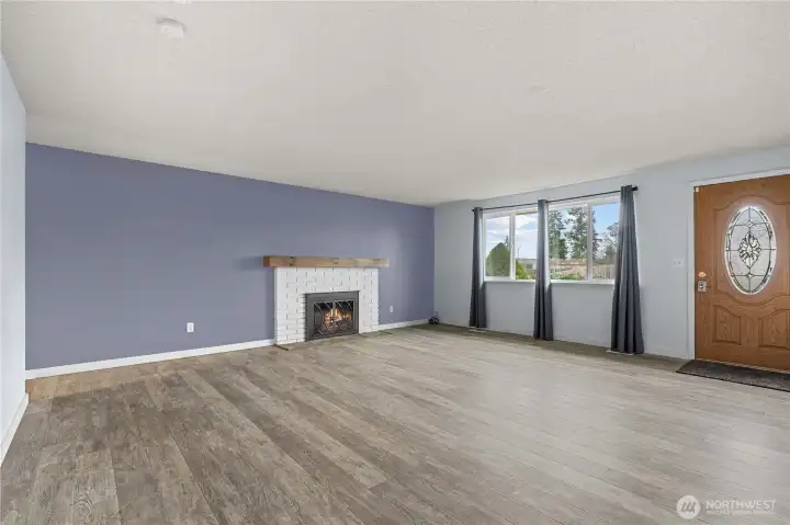 Front Living room w/ wood burning fireplace