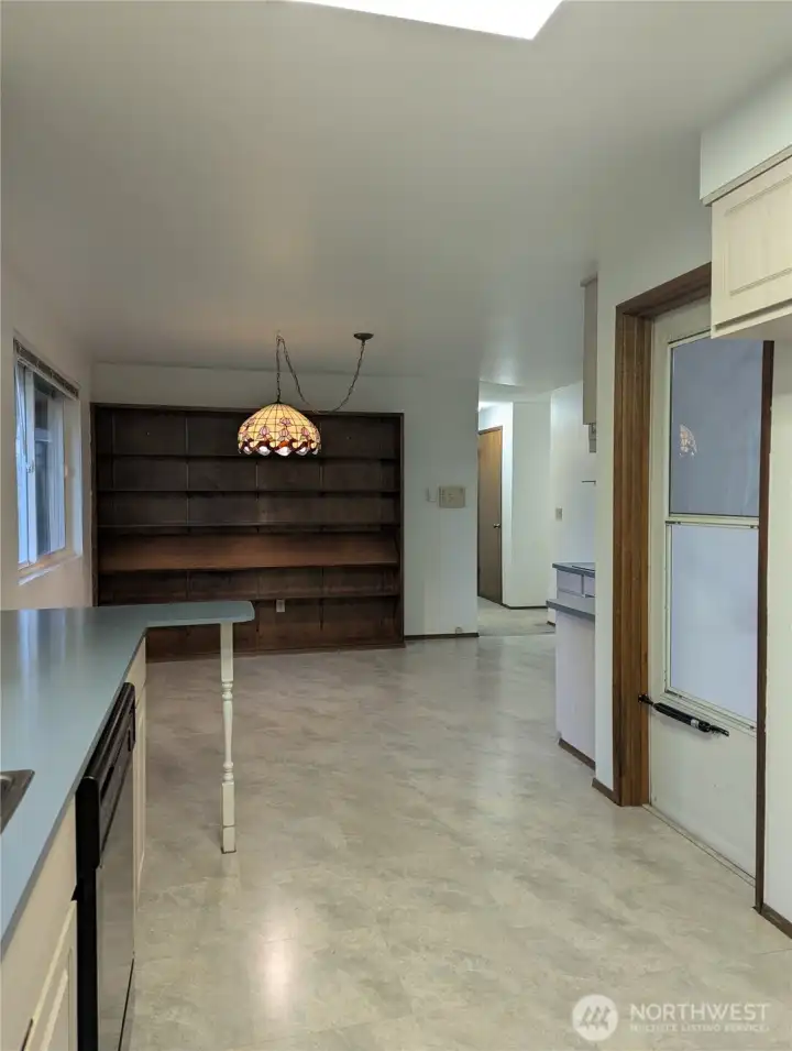 Built in book case great for displaying books or good space for kitchen gagets.