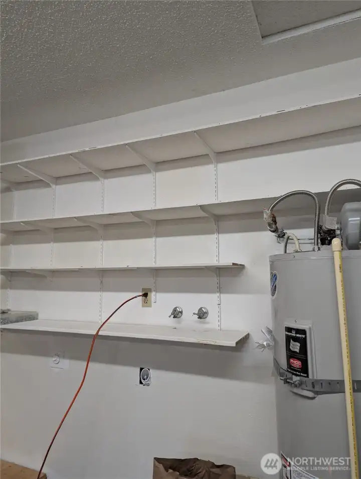 Hot water heater in garage. W?D hookups.