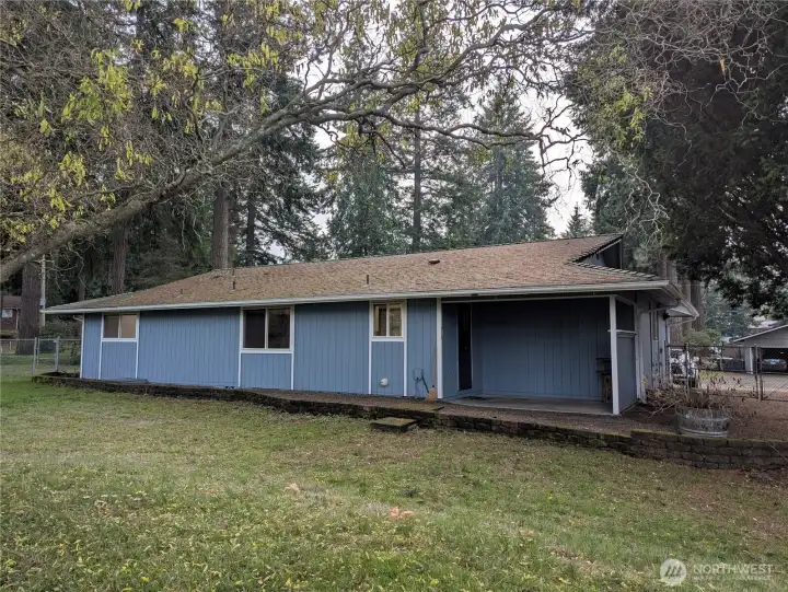 Back side of home. Covered ourdoor area.