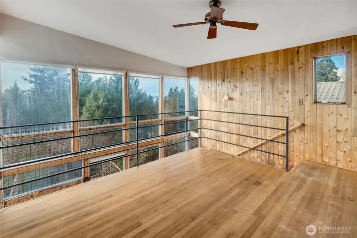Upper open loft sitting space.