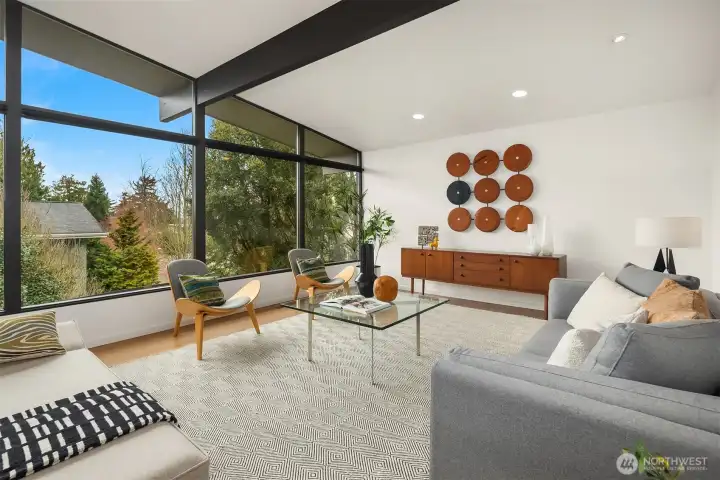 Sleek window shades run the expanse of the larger lower windows, keeping the late afternoon sun at bay when needed.  Central A/C kicks things down a notch on really toasty days.