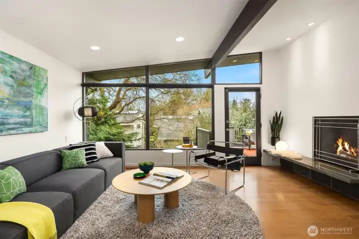 A door off the family room leads to the back deck with stairs to the lower (fenced) yard.